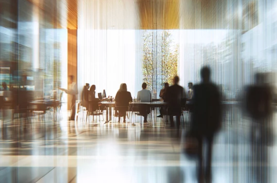 people sitting in a conference room